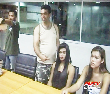 The Iranian tourist points to the man who stole his wallet.